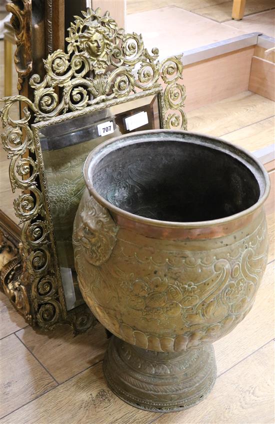 A Dutch brass urn and cast brass mirror Mirror W.45cm, Pot W.42cm